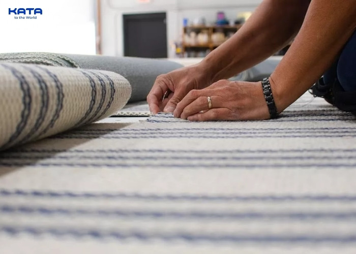 installation of broadloom carpet and tiles