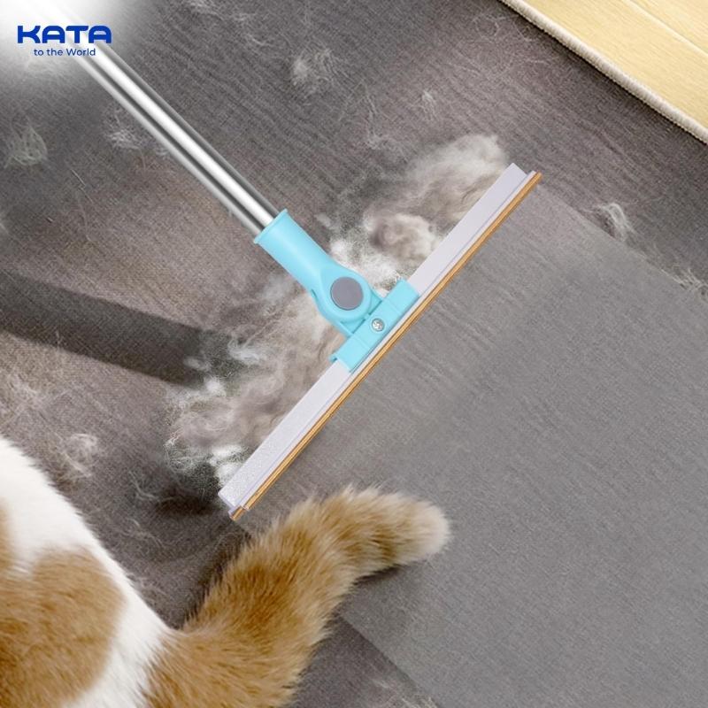 use a squeegee to remove dog hair from the carpet