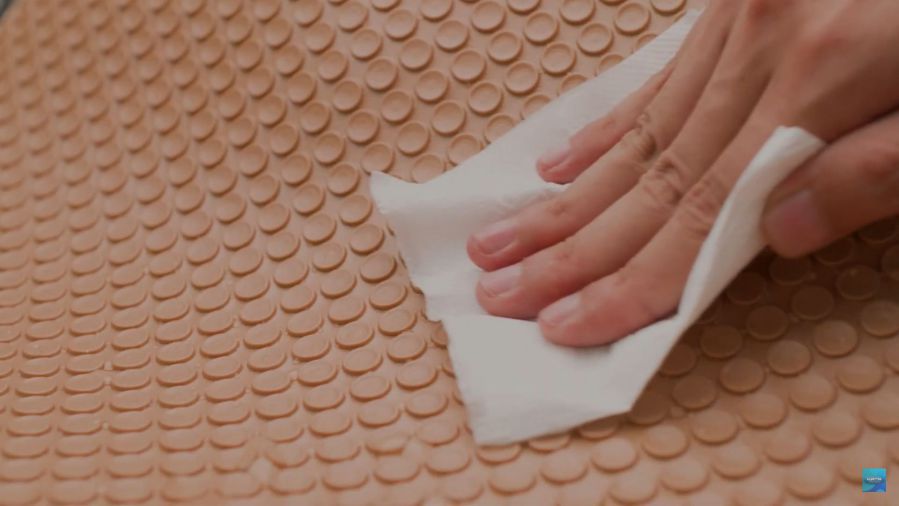 Easy to clean car mat with paper towel